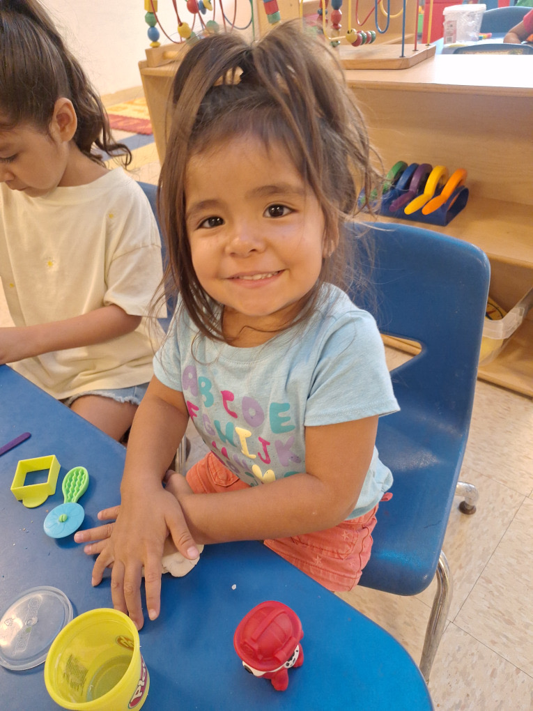 Play dough and a smile at Kingston Academy